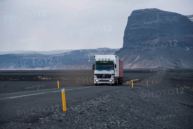Truck driving along the Hringvegur or Ring Road