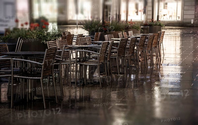 Wet restaurant chairs and restaurant tables
