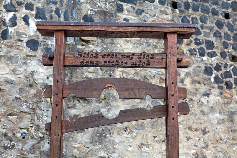 Pillory from the Middle Ages with the inscription 'Blick erst auf dich