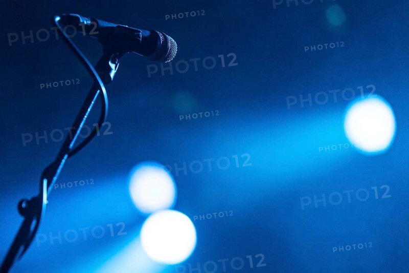 Microphone on a stand in the spotlight