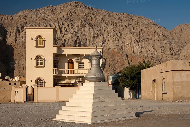Scuplture of a traditional Arabian coffee pot as a symbol of Arab tradition and hospitality