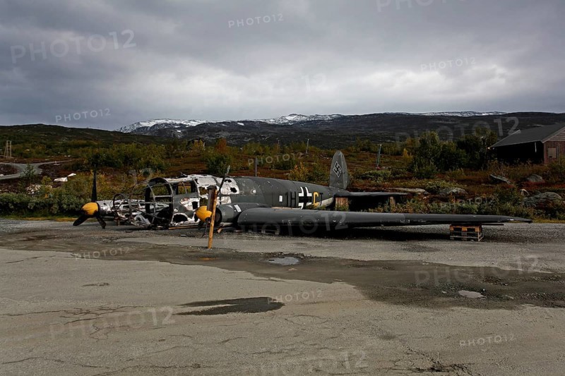 Old destroyed Nazi aircraft by the roadside