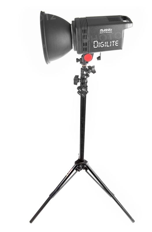 Small studio flash head on a tripod