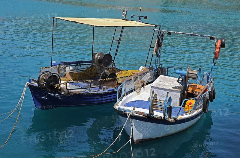 Two small fishing boats in the harbour