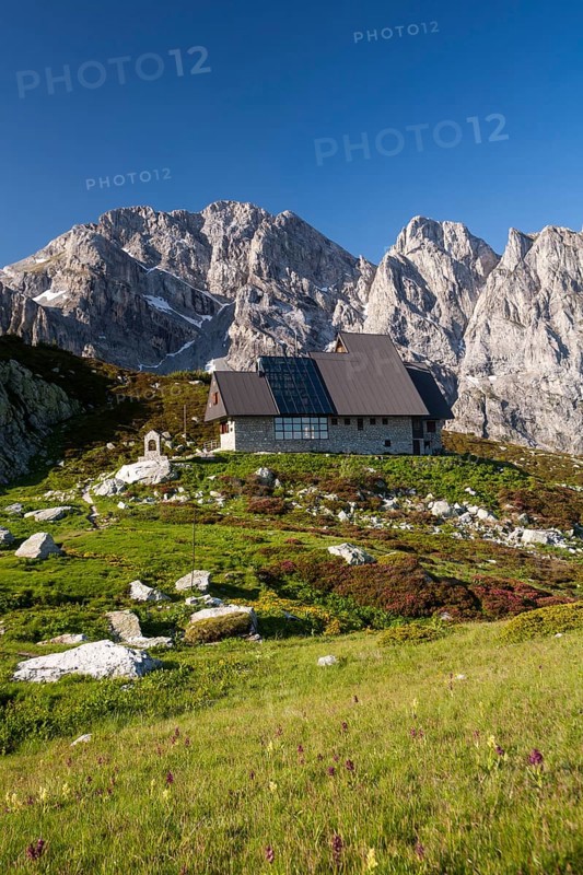 Rifugio Garelli mountain hut in front of the northern face of Punta Marguareis Mountain
