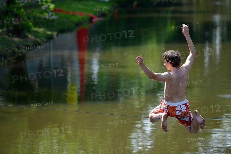 Boy balancing on a slackline
