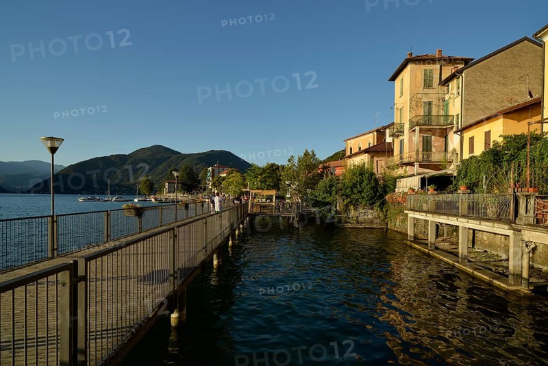 Promenade of Porto Ceresio on Lake Lugano or Lago di Lugano
