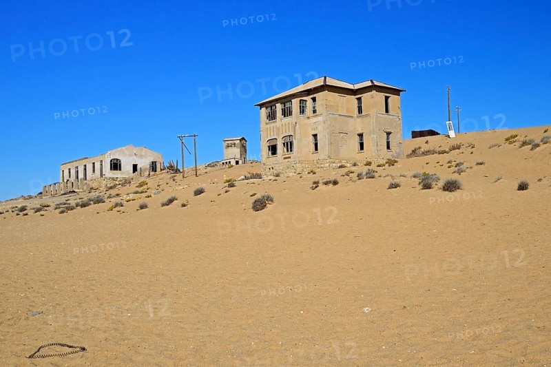 Abandoned houses in the former diamond city of Kolmanskuppe
