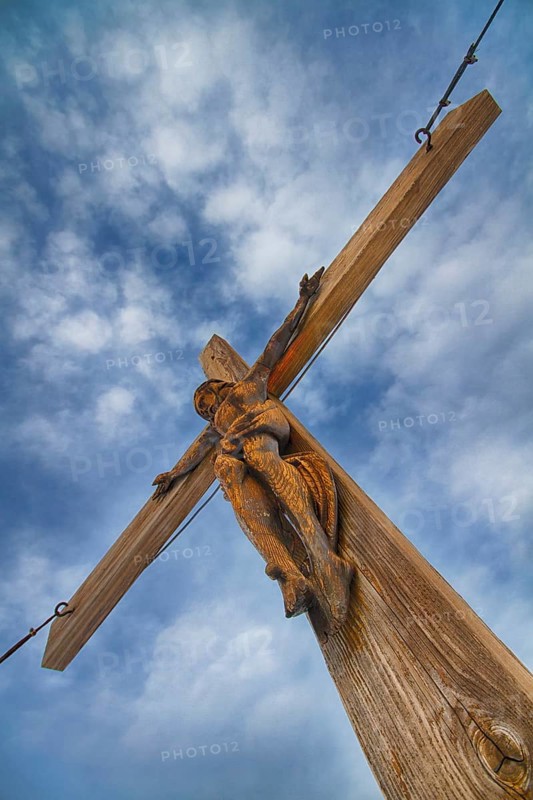 Summit cross on summit of Eiskogel mountain