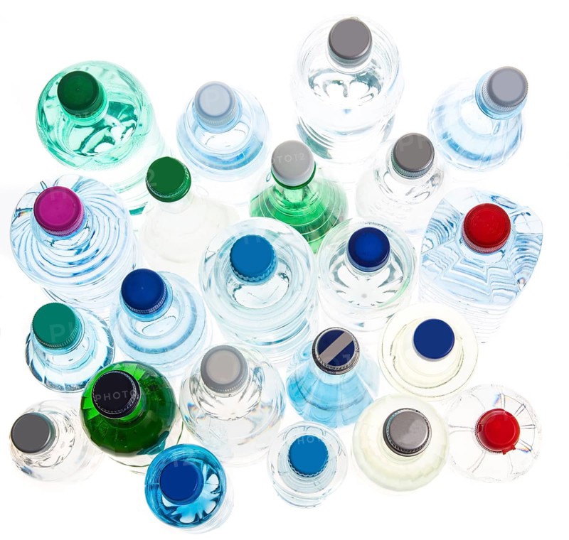 Different varieties of mineral water in bottles made of glass and plastic or PET