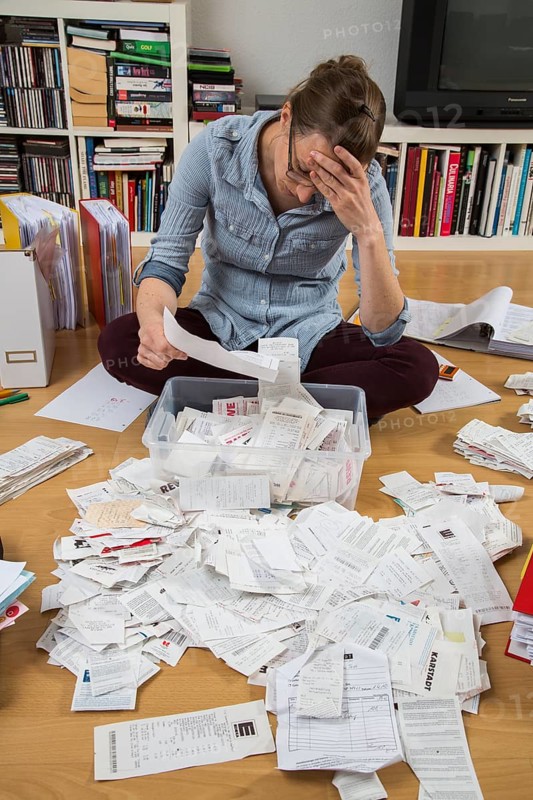 Woman sorting documents