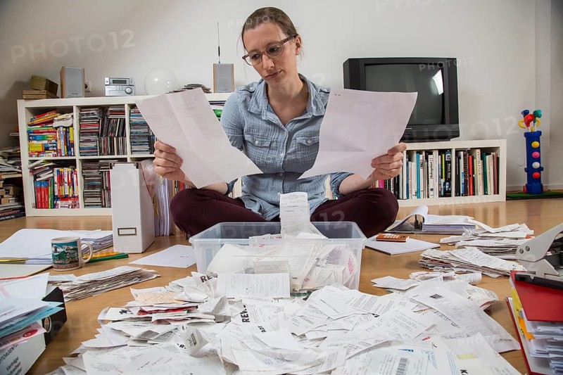Woman sorting documents