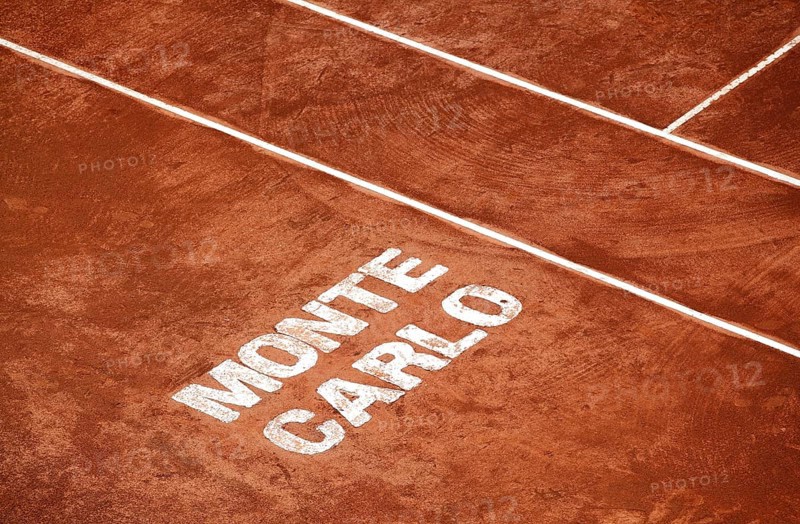 Monte Carlo lettering in the red sand of the Monte Carlo Country Club Centre Court