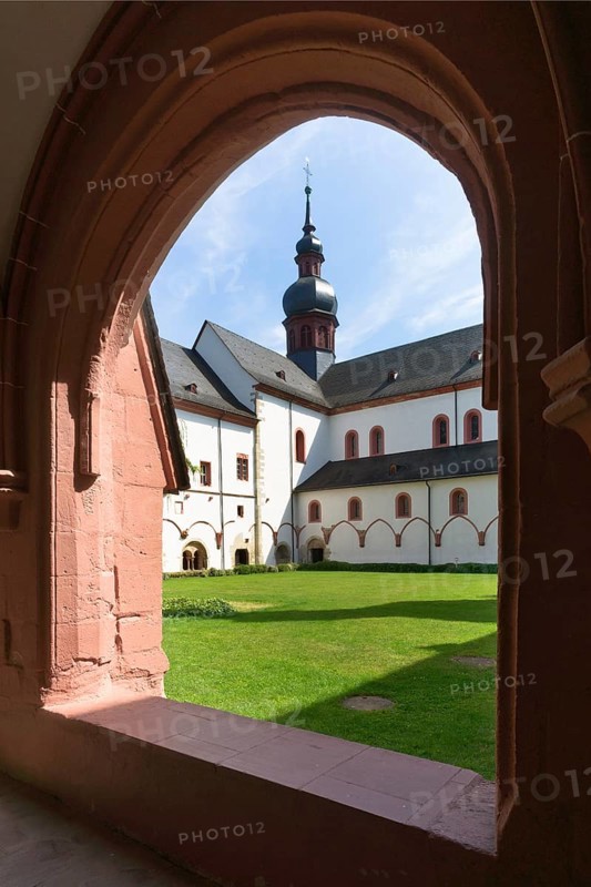 The crossing tower with a Welsh canopy and the north facade of the three-aisled Romanesque basilica