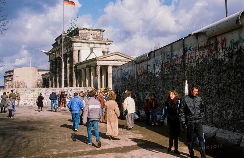 Flag of the GDR waving behind the quadriga on Brandenburg Gate