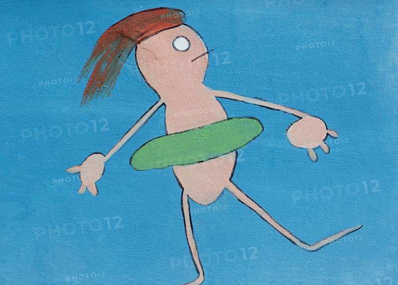 Child with a floating tyre