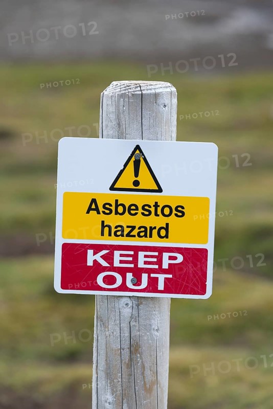 Warning sign 'Asbestos hazard - keep out' at the Stromness whaling station