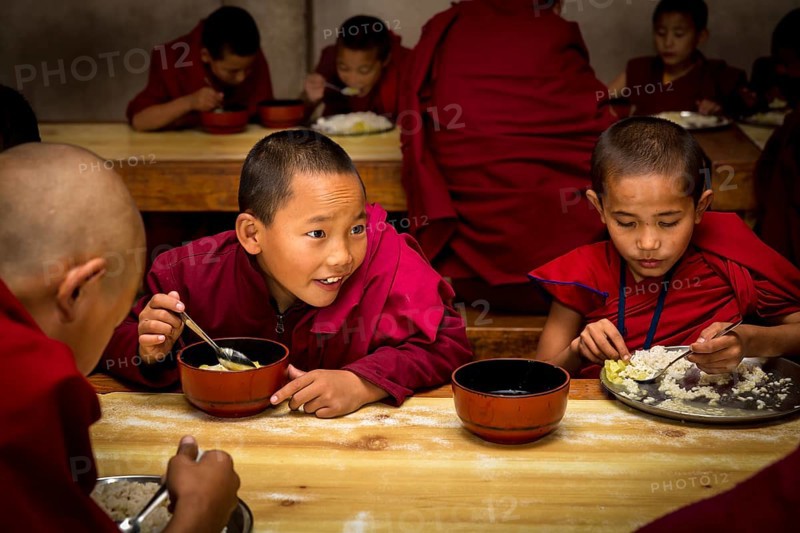 Young monks from Amitabha Monastery having lunch