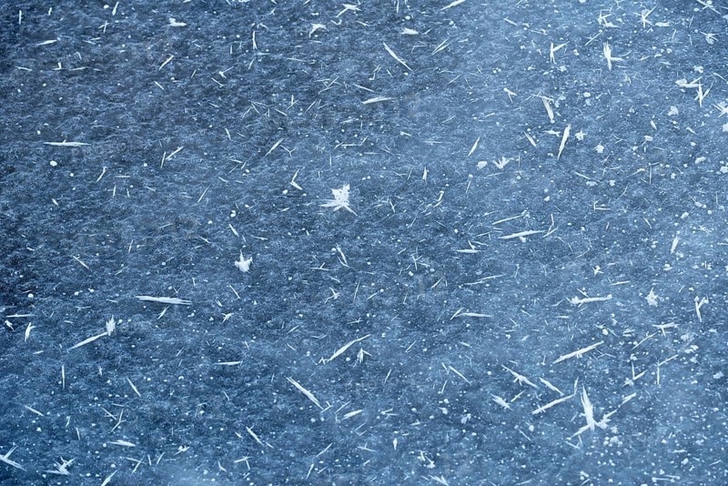 Frost crystals on a patch of ice