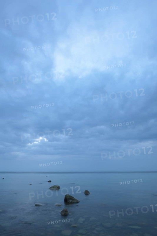 Stones at a Baltic Sea beach at the blue hour