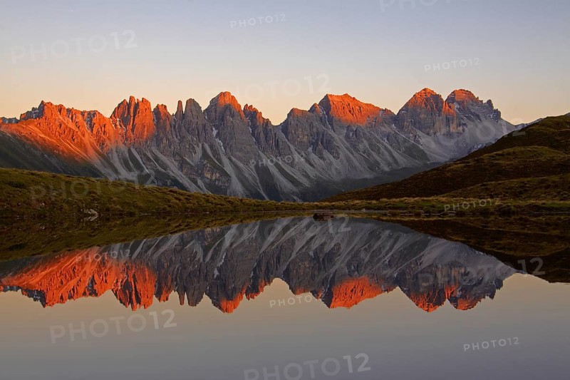 Kalkkoegel mountains reflected in lake