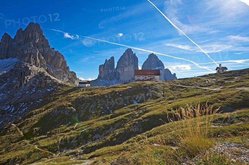 Dreizinnenhuette or Three Peaks Alpine hut and chapel in front of the north face of the Three Peaks