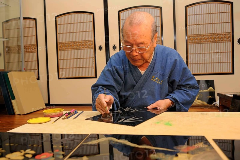 Japanese artisan in his workshop