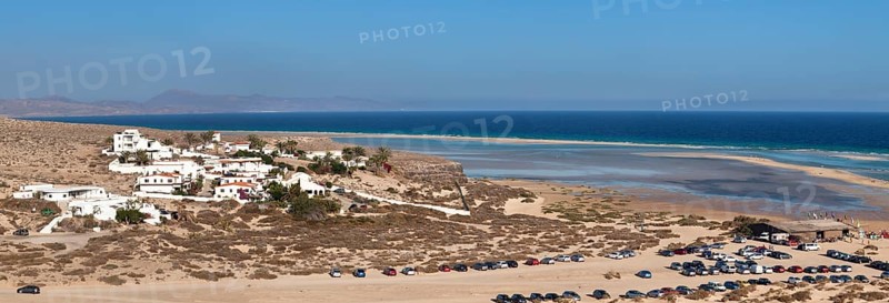Dune landscape near Los Gorriones and the lagoon at back