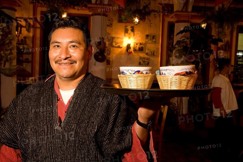Operation in traditional costume at the restaurant 'El fogon de Jovel'