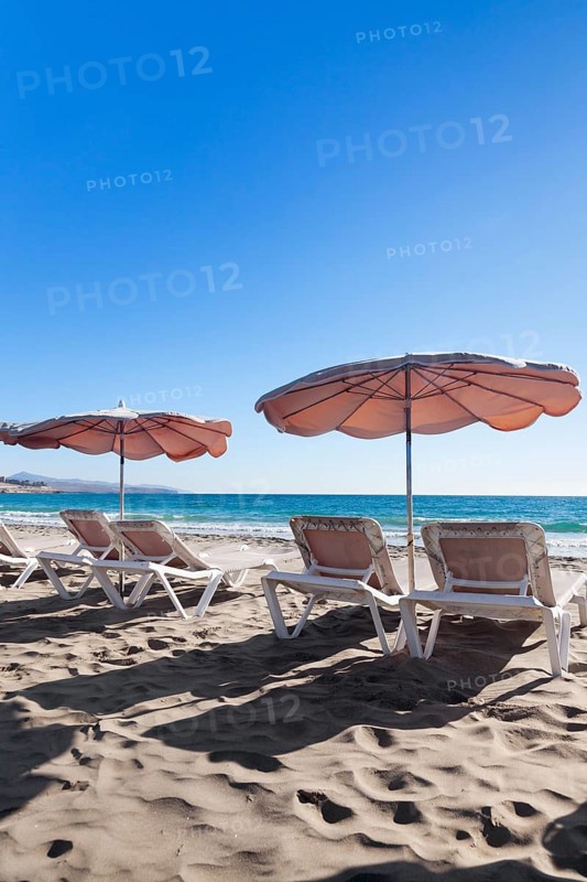 Sun beds and sunshades on the beach