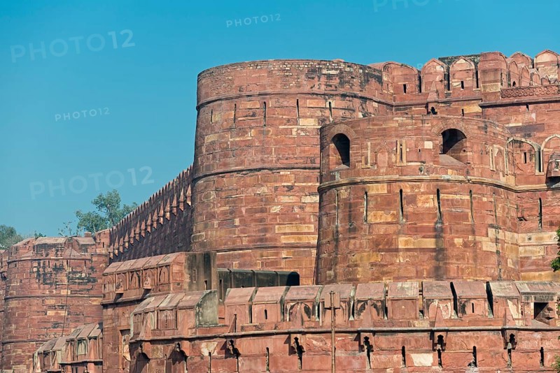 Fortified outer walls with battlements and loopholes