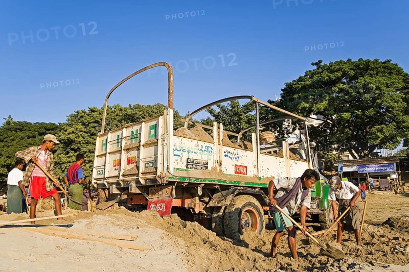 Sand being loaded on the banks of the Ayeyarwady River
