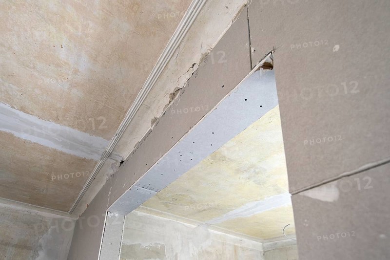 Half-timbered walls coated with plasterboards
