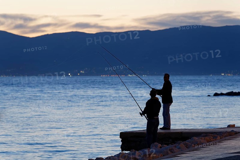 Anglers at dusk