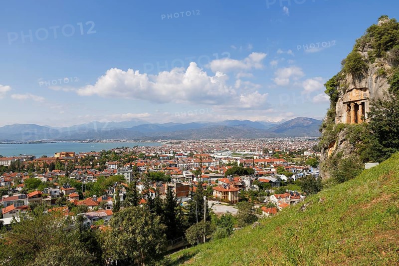 View across the town of Fethiye with Lycian rock tombs