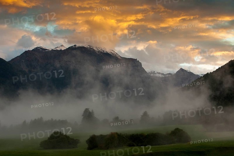Evening mood with ascending mist in autumn