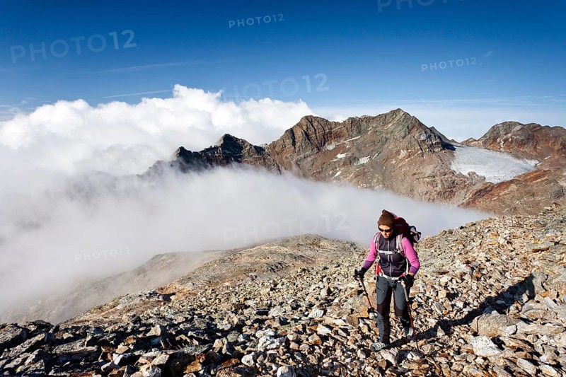 Climber trying to climb Fernerkoefl Mountain in the Rieserferner Group