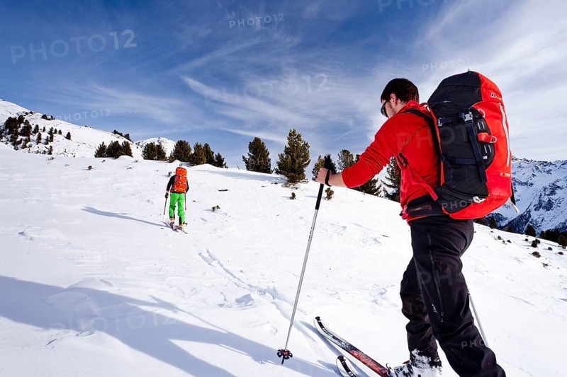 Cross country skiers near Peder-Stieralm mountain pasture