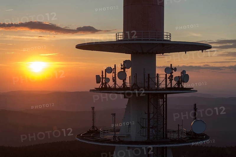 Transmission tower on the summit plateau of Mt Brocken at sunset