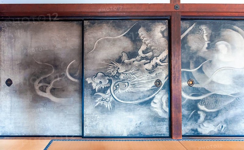 Dragon on a paper wall