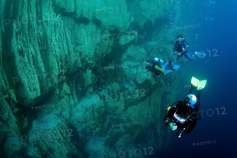Scuba divers in Barracuda Lake