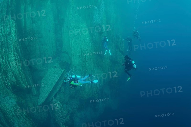 Scuba divers in Barracuda Lake