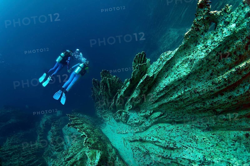 Scuba divers in Barracuda Lake