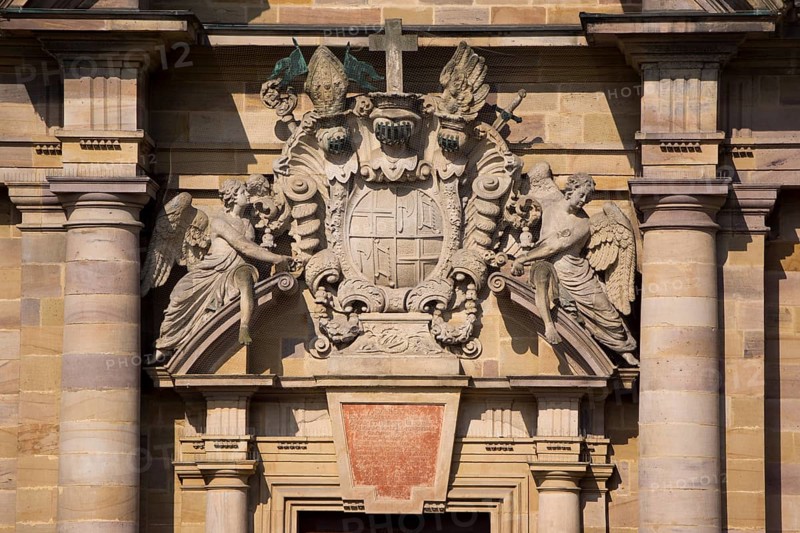 Two angels holding the coat of arms of Prince-Abbot Adalbert von Schleifras above the main entrance of St. Salvator Cathedral of Fulda