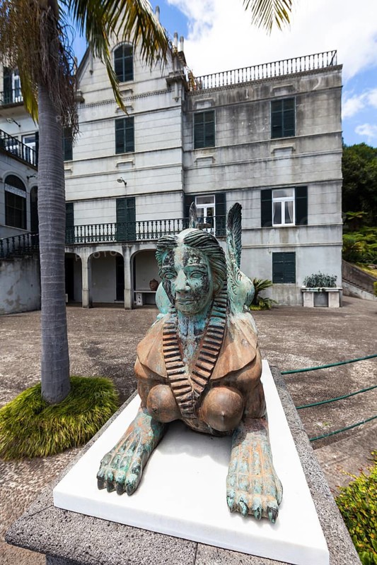 Sphinx sculpture in front of the palace