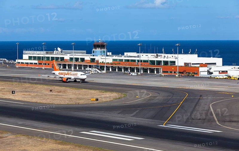 Airbus from easyjet.com in front of the terminal of Madeira Airport