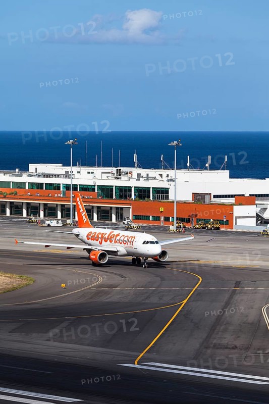 Airbus from easyjet.com in front of the terminal of Madeira Airport