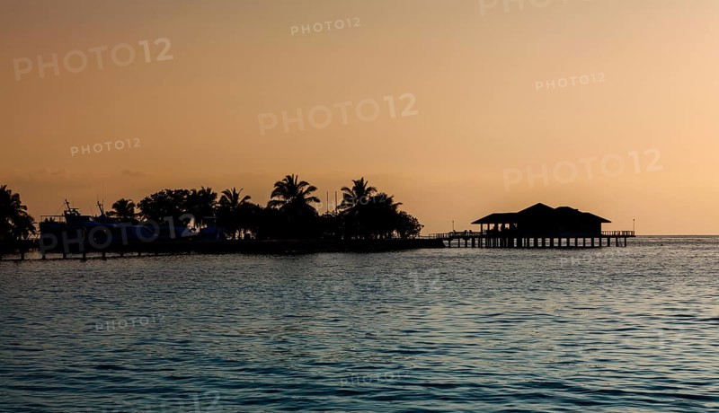View across the lagoon to the jetty and the restaurant on Paradise Iceland