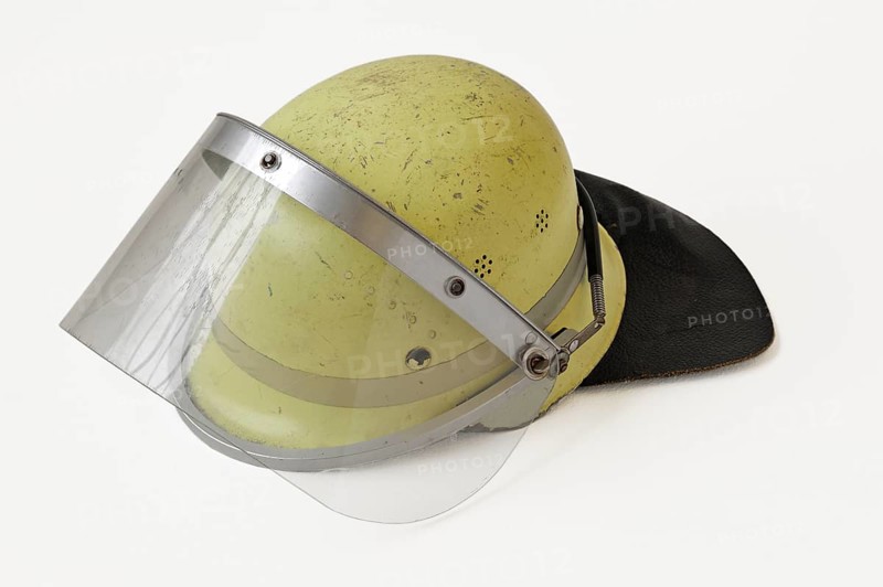 Fireman's helmet with a protective face shield