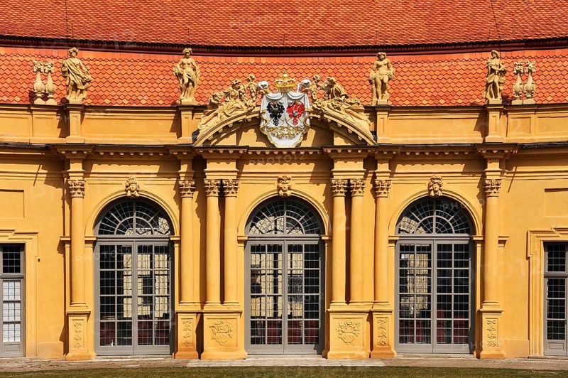 Entrance portal with the coat of arms of the alliance of the margravial constructors at the Orangery in the Castle Garden